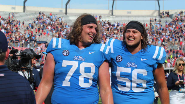 Ole Miss offensive linemen Jeremy James (#78) and Reece McIntyre (#56)